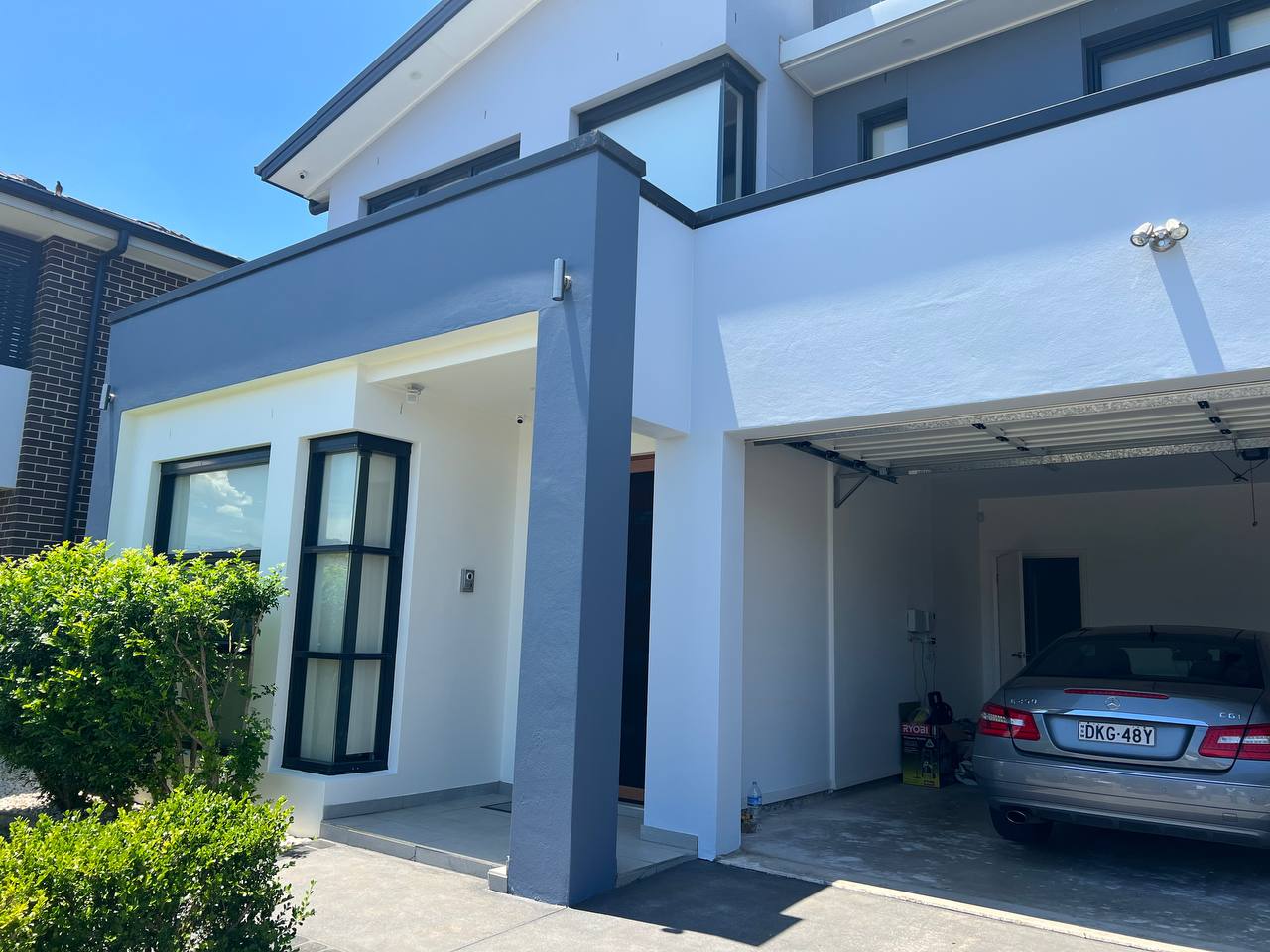 Weatherboard & Render Facades